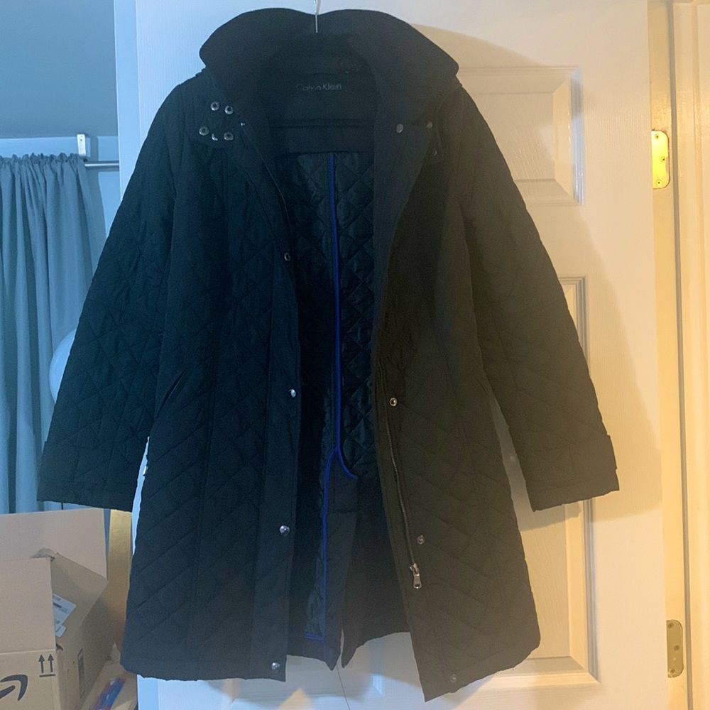 Black long quilted Calvin Klein coat with a hood